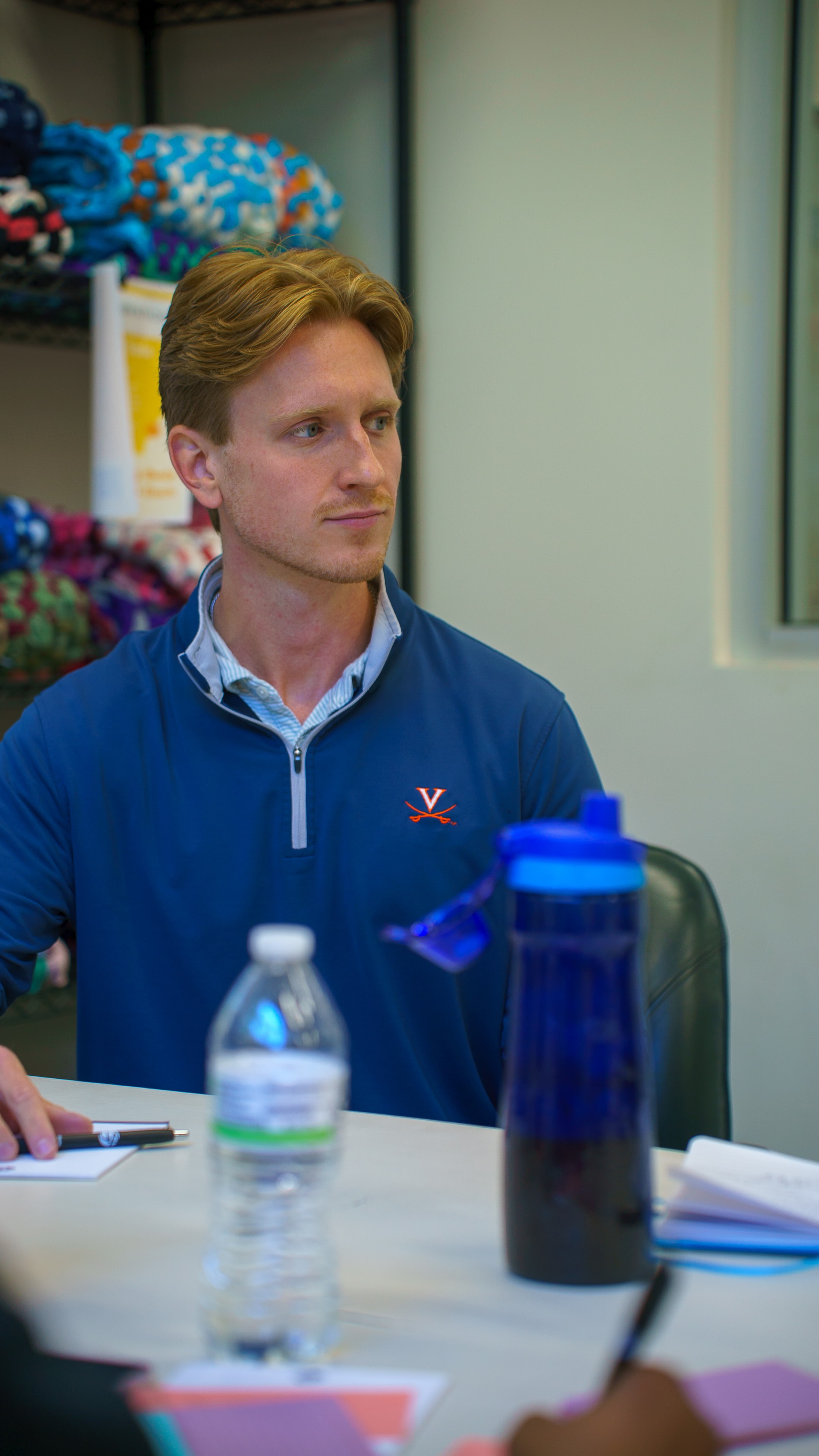 Attendee listening at Friday Morning Fundraising session