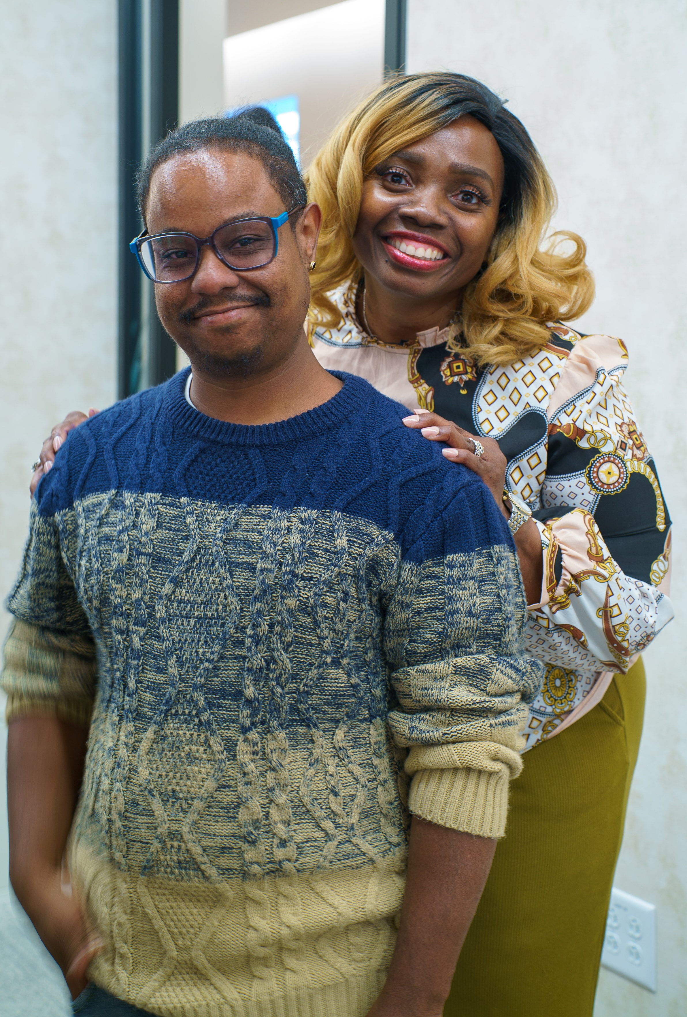 Two people smiling together at Friday Morning Fundraising