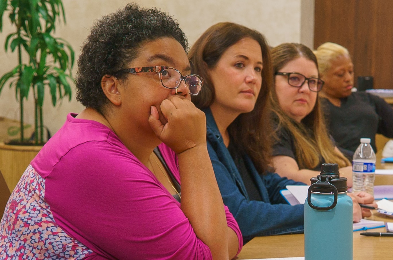 Group of women engaged in conversation at Friday Morning Fundraising